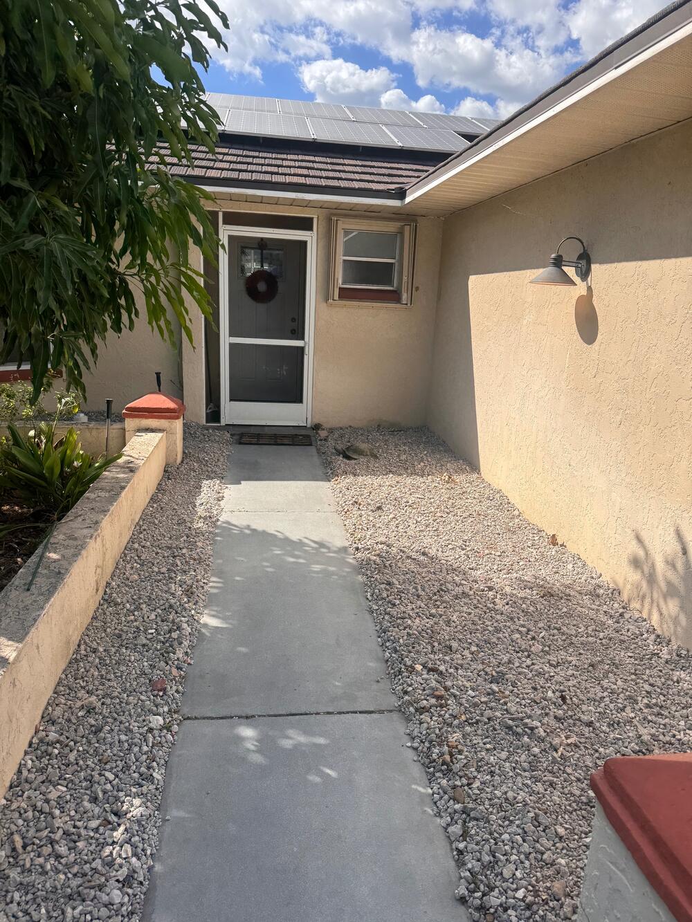 Rock beds along a front entry walkway